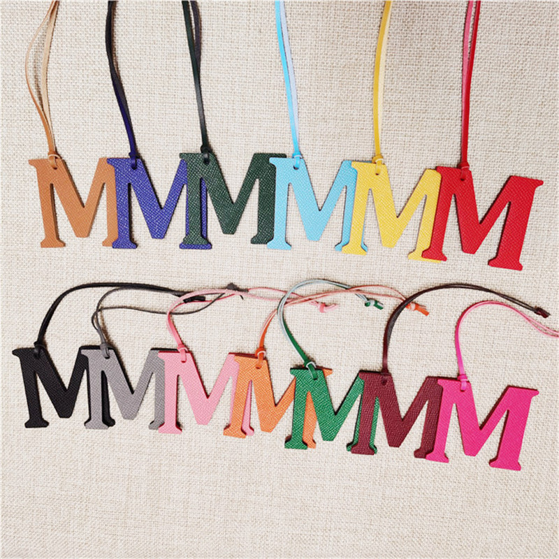 Monogram Keychain Leather - XMESSUN พวงกุญแจหนังแท้รูปตัวอักษรภาษาอังกฤษ M ดีไซน์หรูหรา สำหรับตกแต่งกระเป๋าผู้หญิง